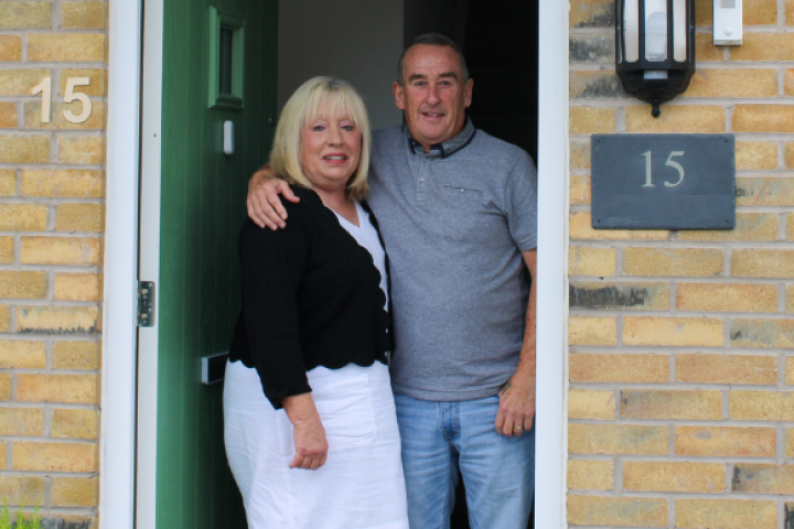 Couple stood at the front door