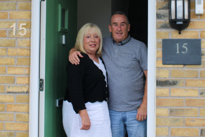 Couple stood at the front door