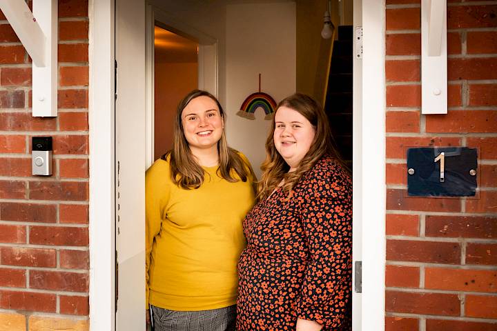 Couple standing in the door